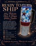 A promotional product of a 30oz glitter tumbler from TK Whiskey & Wildflower Co. The tumbler is shown on the right with a handle and lid, decorated with holographic stars in blue, red, and silver.