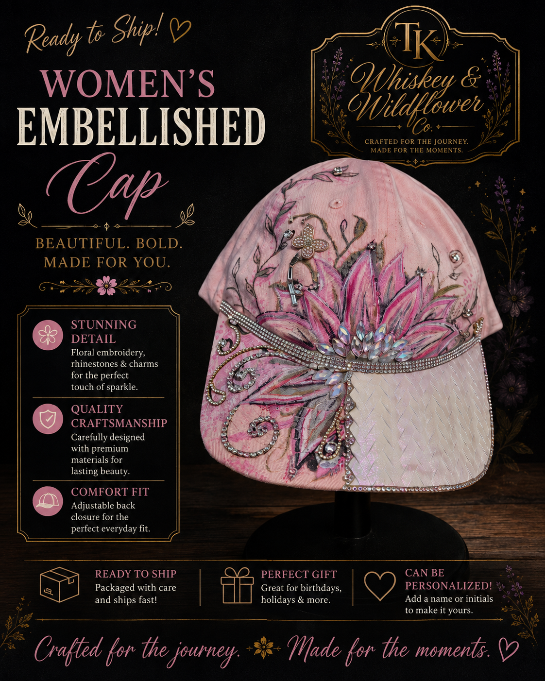 A pink embellished women's cap displayed on a black stand against a dark decorative background. The hat features a large pink floral applique with gold embroidery, butterfly motifs, and rhinestone trim.